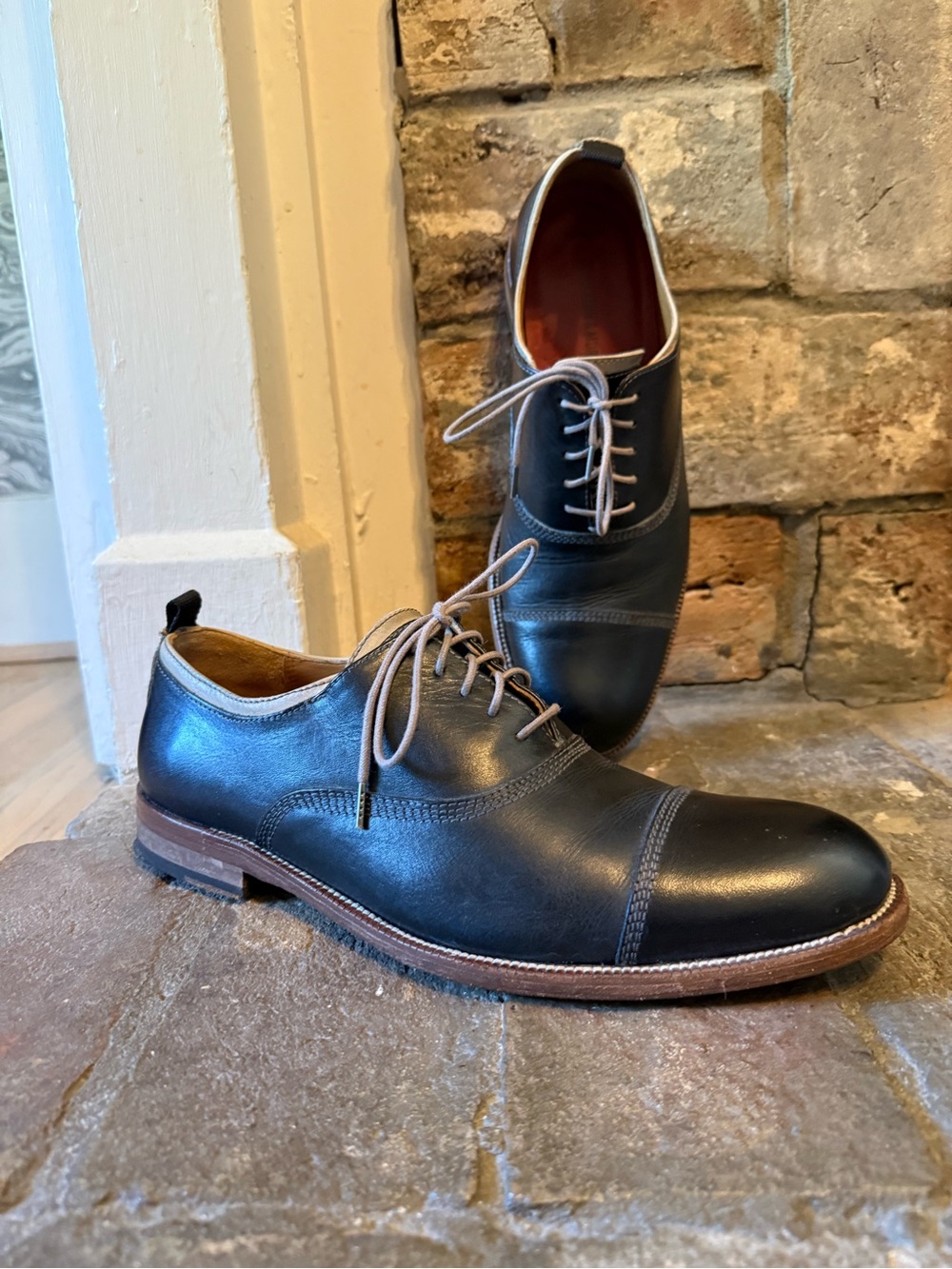 Johnston & Murphy Black Leather Cap-Toe Derby with Brown Sole